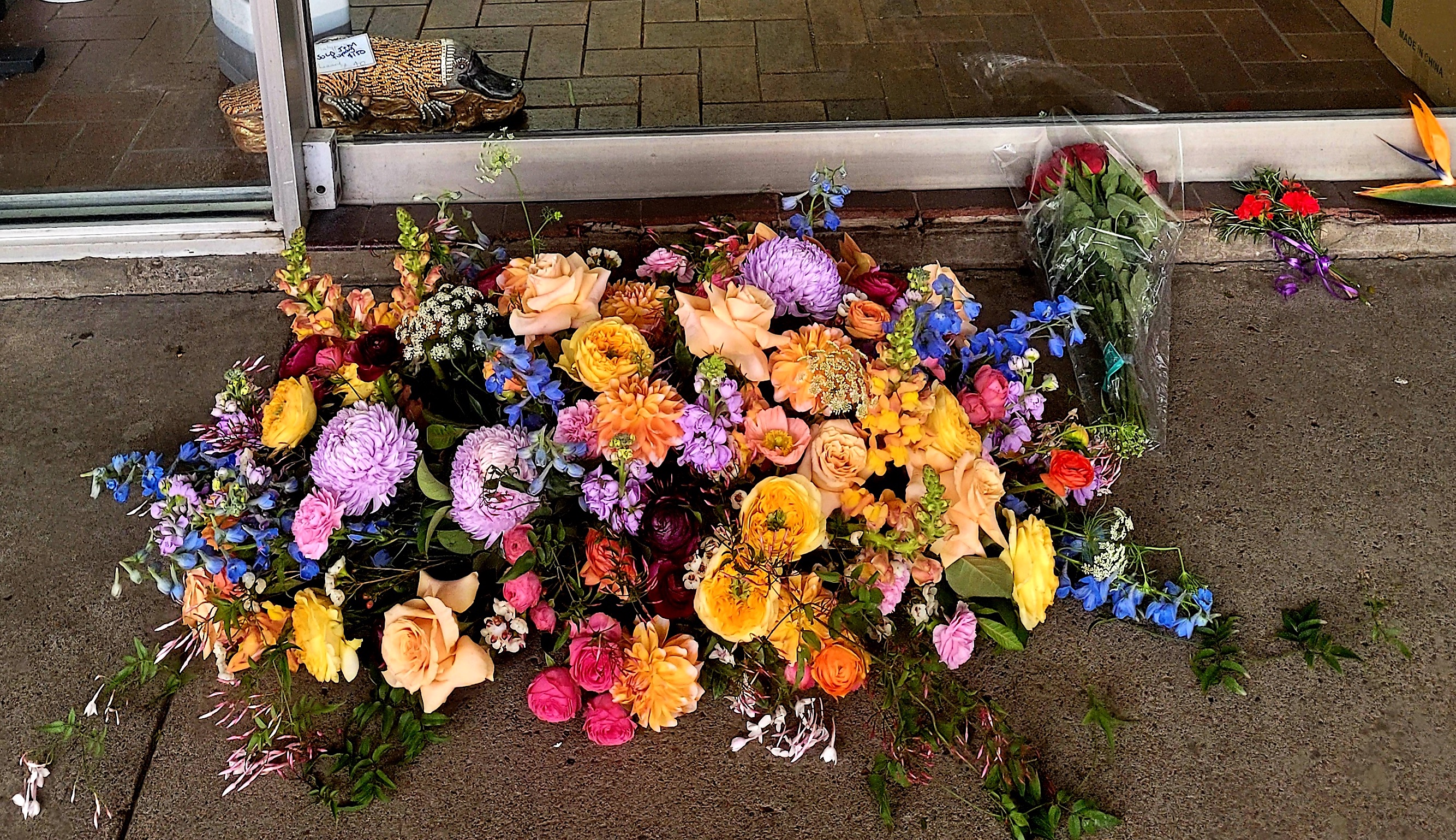 A wreath outside Ros 's shop