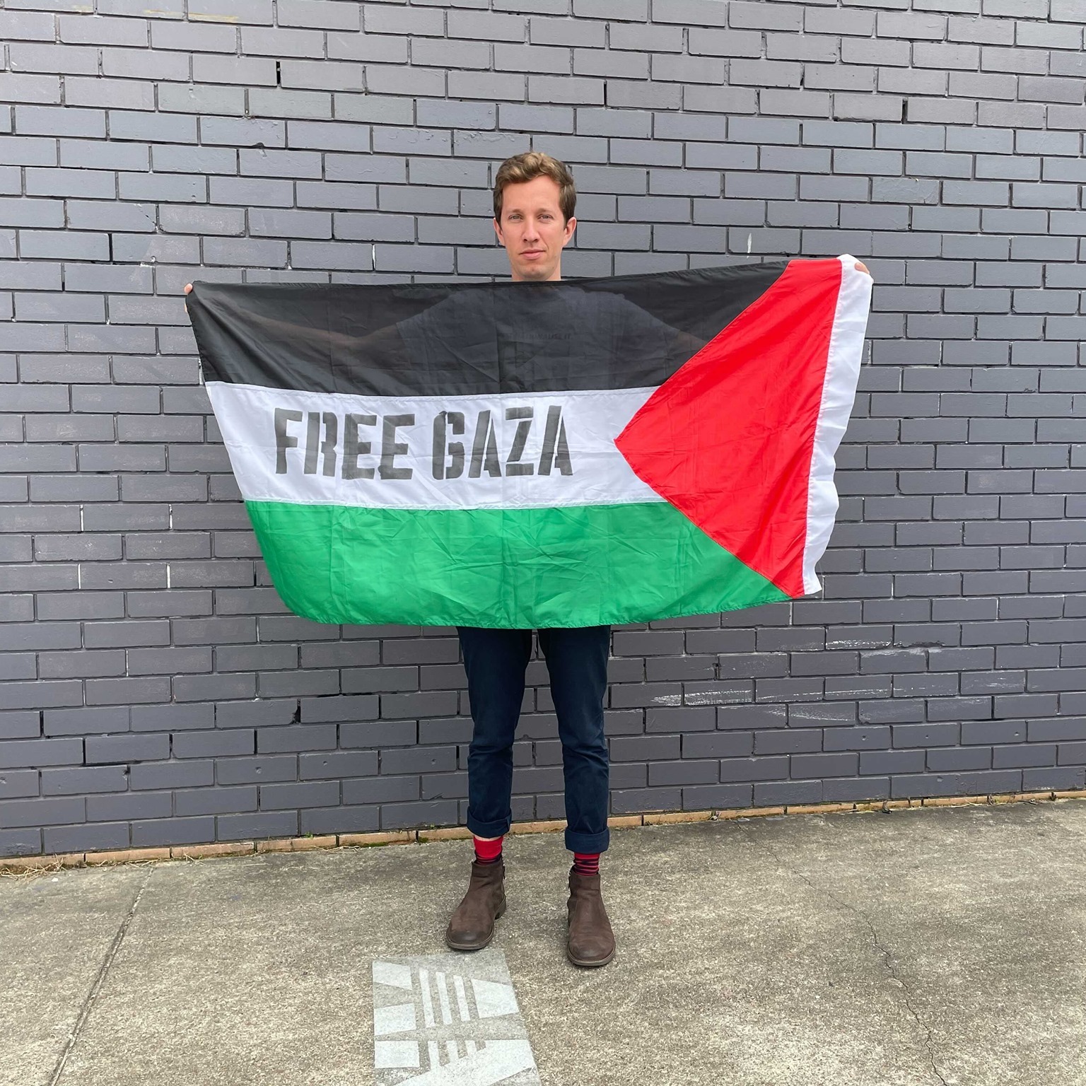 Max outside his office in Stones Corner 2021